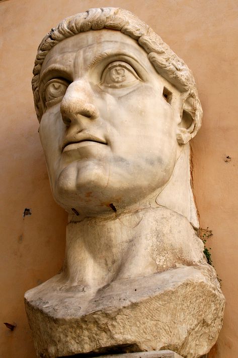 Head of Constantine's colossal statue at the Capitoline Museums. The original statue of marble was acrolithic with the torso consisting of a cuirass in bronze. Arch Of Constantine, Constantine The Great, Colosseum Rome, Ancient Roman Coins, Roman Sculpture, Byzantine Empire, Roman Emperor, Byzantine Art, Roman History