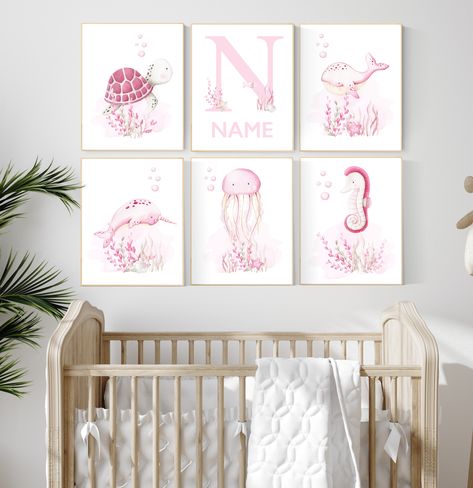 Ocean themed nursery, girl nursery, ocean nursery, under the sea nursery, pink nursery, whale nursery, sea nursery decor, sea turtle Girl Ocean Nursery, Nursery Under The Sea, Sea Nursery Theme, Pink And Green Nursery, Nautical Baby Room, Nursery Ocean, Under The Sea Nursery, Ocean Themed Nursery, Beach Nursery