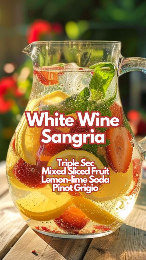 Summer calls for a refreshing drink and this White Wine Sangria hits the spot every time. With crisp Pinot Grigio, a splash of Triple Sec, and a mix of fresh fruits like strawberries, peaches, and citrus, it’s a favorite for cooling down and relaxing. The lemon-lime soda adds the perfect fizz, enhancing the natural sweetness of the fruits. #whitewinesangria via @mybartender Sangria With White Wine, Pino Grigio Sangria, White Sangria Recipe Easy Summer, White Wine Sangria Recipe Summer, Easy White Sangria Recipes, Recipes Using White Wine, White Sangria Recipe For A Crowd, Sangria Recipes White, Pinot Grigio Sangria