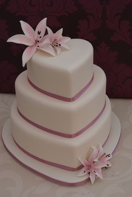 Lilies Heart Wedding Cake by Cakes by Occasion, via Flickr Heart Shaped Wedding Cakes, Cake Heart, Heart Wedding Cakes, Heart Cakes, Heart Shaped Cakes, Wedding Cakes Blue, Wedding Cakes With Cupcakes, Elegant Wedding Cakes, Wedding Cakes With Flowers