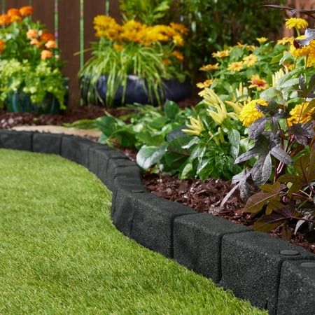 Transform your garden with ease using GroundSmart Cobblestone Rubber Landscape Edging Made of flexible rubber, this edger curves to your landscape for a beautiful finish. Installation is a breeze with the SmartLoc connecting system, results in a seamless fit between edging pieces for a professional look. GroundSmart Cobblestone Landscape Edging is perfect for flower beds, walkways, patios and much more. The no dig installation makes set up simple and hassle-free. Make your landscape stand out with the GroundSmart Cobblestone Landscape Edging. Size: 48" x 3" x 3".  Color: Black. Paver Garden Edging, Garden Edging Stones, Plastic Garden Edging, Garden Lawn Edging, Patio Edging, Garden Border Edging, Brick Garden Edging, Flower Bed Borders, Flower Bed Edging