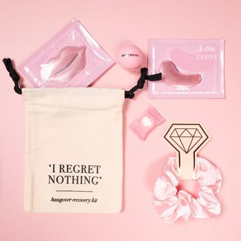 ADD TO CART 🛒 Meet our Filled Hen Party Hangover Recovery Kit! A great way to nail those hen party favours if you’re pressed for time 🫶🏼 Includes: 💗’I Regret Nothing’ Hangover Cotton Pouch 💗Lip Balm 💗Diamond Pink Satin Scrunchie 💗Pair of Hydrogel Pink Eye Masks 💗Pink Hydrogel Lip Mask 💗Compressed Face Wipe Hen Do Party Bags, Pink Satin Scrunchie, Hangover Recovery Kit, Hangover Survival Kit, Jelly Bags, Paper Party Bags, Hen Party Bags, Hen Party Gifts, Bridesmaid Duties