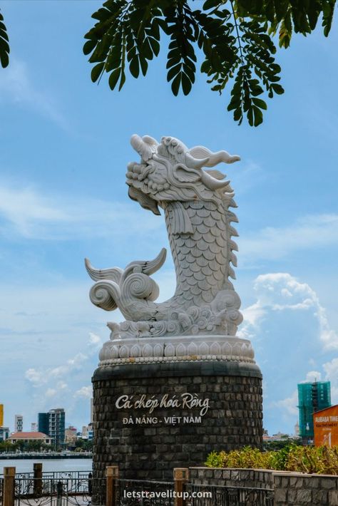 Chinese Fengshui Fish statue in Da Nang Vietnam close to the river. Danang Vietnam, Da Nang Vietnam, Vietnam Travel Guide, Vacation Locations, Vietnam Travel, Da Nang, Amazing Destinations, Asia Travel, Tourist Destinations