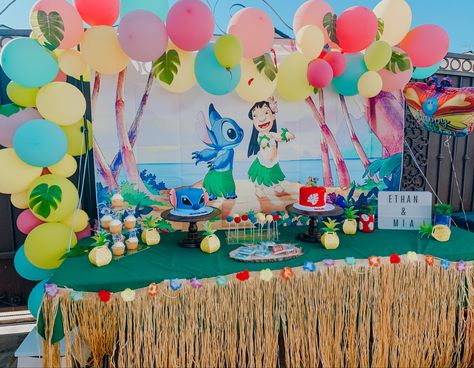 Stitch Party Table Decorations, Lilo And Stitch Treat Table, Lilo And Stitch Second Birthday Party, Lilo And Stitch Birthday Decorations, Lilo And Stitch Dessert Table, Stitch Hawaiian Party, Lilo And Stitch Birthday Party Ideas Diy, Lilo And Stitch Birthday Party Ideas, Stitch Birthday Backdrop