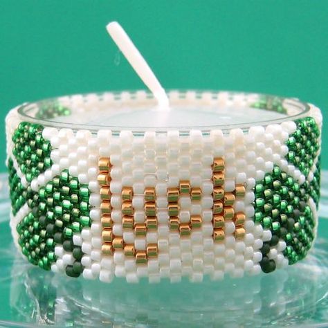 Good Luck Tea Light Cover / Napkin Ring | Bead-Patterns.com Stitch Beads, Beaded Candle, Beaded Banners, Holiday Beading, Beading Crafts, Brick Stitch Pattern, Beaded Boxes, Seed Bead Patterns, Beaded Christmas Ornaments