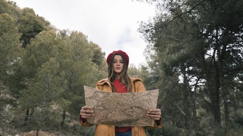 Portrait of a female hiker standing in the forest reading the map | Premium Photo #Freepik #photo #tree #people #travel #education Map Portrait, Female Hiker, Banksy Mural, Picnic Photo Shoot, Tree People, Photo Tree, Outdoor Brands, The Map, In The Forest