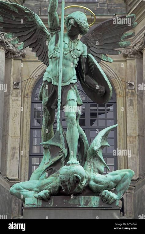 Download this stock image: Hamburg, Germany, Statue of Saint Michael the Archangel over the portal of the church. Deutschland, Statue des Erzengels Michael über dem Portal. - 2C04FK4 from Alamy's library of millions of high resolution stock photos, illustrations and vectors. Saint Michael The Archangel, Ancient Gods, Michael The Archangel, Greek Tattoos, Saint Michael, The Portal, Hamburg Germany, Angel Art, St Michael