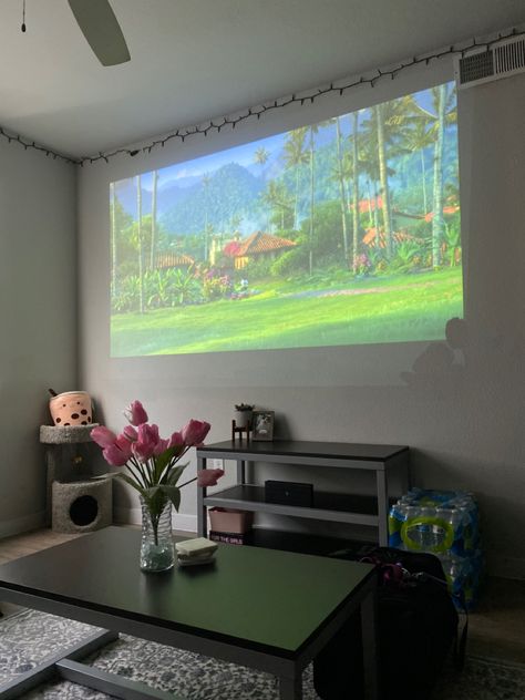 Projector In Room Aesthetic, Projector Instead Of Tv, Projector In Living Room Aesthetic, Projector Setup Ideas Living Room, Film Projector Aesthetic, Projector Living Room Ideas, Living Room With Projector Ideas, Living Room Projector Setup, Living Room Projector Wall