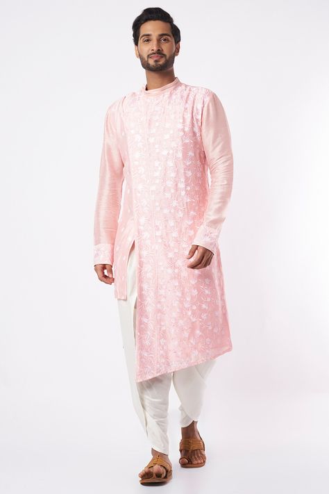 Featuring a pastel pink kurta in art dupion silk base with zari, thread, and floral jaal embroidery. It is paired with contrasting off white cotton silk dhoti pants.  FIT: True to size. COMPOSITION: Art dupion silk, Cotton silk. CARE: Dry clean only. Jaal Embroidery, Pink Kurta, Dhoti Pants, Dupion Silk, Indian Fashion Designers, Pernia Pop Up Shop, Kurta Set, Pop Up Shop, Cotton Silk