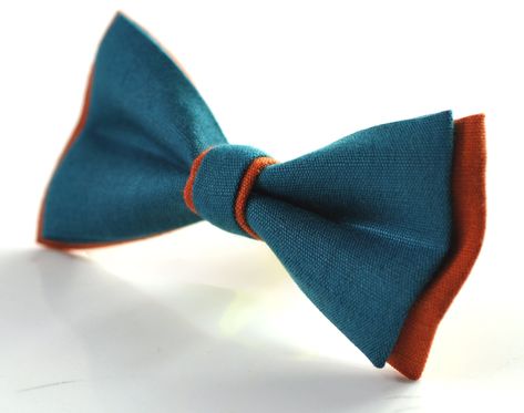 Welcome to OsunWorld! Item        Turquoise Teal Blue and Burnt Orange Linen Cotton Pre tied Bow tie ConditionBrand New Color       Teal and Burnt Orange Material        Linen Size               New Born: L80mm/45mm/3.15*1.77 inch                                 1-6 Years Old: L90mm*W50mm/ 3.50*1.97inch                                7-14 Years Old: 105mm*W55mm/ 4.13*2.17inch                                ADULT (INCLUDE 15-18 Years Old) : 120mm*65mm/4.72*2.56inch                          Adjust Teal Blue Weddings, Burnt Orange Weddings, Orange Bows, Teal Wedding, Pre Tied Bow Tie, Dark Turquoise, Orange Wedding, Orange Shirt, Flash Photography