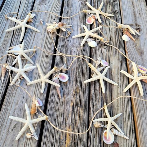 PRICES MAY VARY. STARFISH & SHELLS HEMP ROPE HANGING 10ft+ (120"+) - Our coastal garland is fully loaded with 12 off-white 4"-6" natural starfish and different real seashell clusters that bring a beautiful beachy vibe to any outdoor event or indoor space. Fully stretches to 120"+ inches! INDOOR/OUTDOOR USE BEACH THEME PARTY & BEACH WEDDING DECOR - The perfect addition to your beach wedding decorations, very versitle uses such as headbanner, aisle ropes, bridal entry gates, wedding tent hanging d Coastal Garland, Beach Garland, Recruitment Decorations, Beach Theme Party Decorations, Beach Theme Party, Shell Garland, Bridal Entry, Beach Christmas Decorations, Beaded Starfish