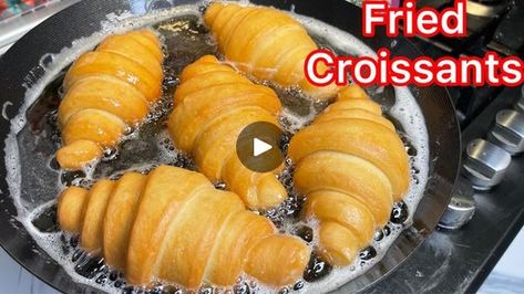 How To Make FRIED CROISSANTS RECIPE | Easy and Delicious 😋 | How To Make FRIED CROISSANTS RECIPE | Easy and Delicious 😋 | By Gina Amon Channel | Hello, beautiful and wonderful people. Welcome back to Gina Amon Channel. If you are new here, it's so great to have you. Please don't forget to follow my page and subscribe to my channel as well. In today's recipe, I'll share with you how to make easy fried croissants. This is very easy to make and it turn out so so delicious. I hope you're going to give this recipe a try. Let's get started. So, going to first start with the dry ingredients. In the mixing bowl, I add in flour, dry active yeast, you can use the fresh one as well. Add in sugar, vanilla extract and a pinch of grated nutmeg which is totally optional. Stir all these ingredients toge Fried Croissant Recipe, Fried Croissant, Fried Croissant Crescent Rolls, How To Make Croissants Video, No Yeast Croissant Recipe, Making Croissants, Croissant Recipe, Yeast, Make It Simple