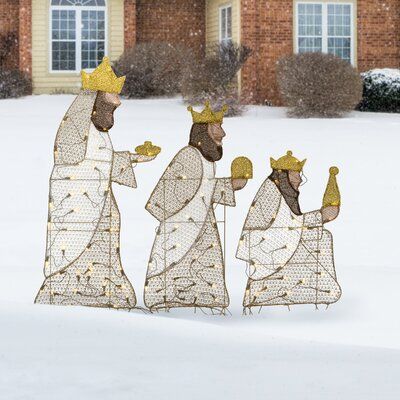 This set includes images of the three wise men each bearing their gift for the newborn savior. It features metal frame construction wrapped in a fabric material that is strong and durable to provide many years of enjoyment. Set is pre-lit with a total of 105 warm white twinklings LED lights that make this decoration sparkle and shine. This holiday trimming can be displayed in indoor or outdoor locations. | The Holiday Aisle® Three Wisemen Lighted Display, Metal in Gray / White, Size 42.0 H x 9.0 Yard Sculptures, Christmas Yard Decorations, Christmas Nativity Scene, Three Wise Men, Outdoor Holidays, Christmas Yard, Outdoor Holiday Decor, Decorating With Christmas Lights, Wise Men