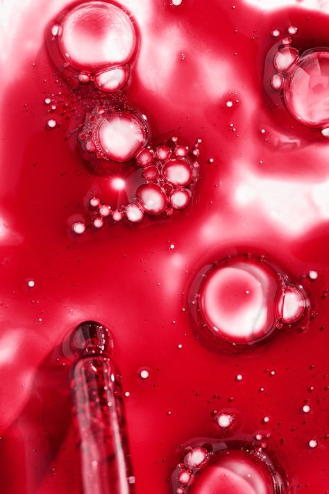 Photograph of exfoliating mask texture with glass dropper and bubbles within the red liquid by Chicago Commercial, Beauty and Fashion Photographer, Olivia Kohler. Beauty Product Texture Photography, Strawberry Texture, Liquid Photography, Liquid Texture, Red Liquid, Lip Gloss Cosmetics, Photo Products, Exfoliating Mask, Product Photographer