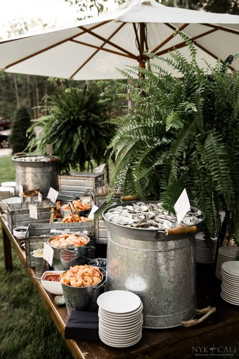 Seafood Station Wedding, Oyster Roast Table Decorations, Oyster Roast Decor, Oyster Roast Decorations, Oyster Roast Rehearsal Dinner, Backyards Weddings, Seafood Station, Oyster Roast Party, Bohemian Chic Wedding