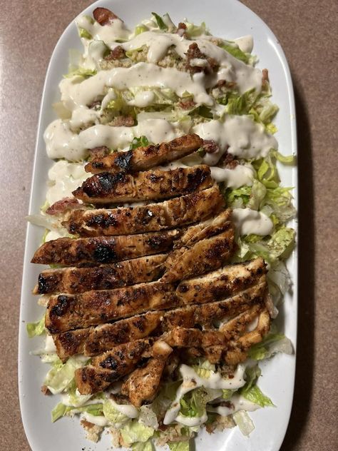 Grilled chicken, Caesar salad\nHeat a grill over medium-high heat. Marinate chicken in your favorite sauce. Grill for 10 minutes, flipping halfway. Serve with Caesar salad.\n#GrilledChicken #CaesarSalad Grilled Chicken Caesar, Grilled Chicken Caesar Salad, Marinate Chicken, Chicken Caesar, Chicken Caesar Salad, Grilled Chicken Salad, Interesting Food, Recipe Boards, Caesar Salad