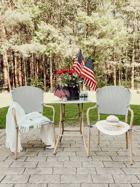 When entertaining outdoors in the heat of summer, place a bistro set in a shady place for guests to relax and cool off. Decorating With Flags, Cozy Outdoor Spaces, Memorial Day Ideas, Patio Entertaining, Entertaining Outdoors, Olive Bucket, Fallen Soldiers, Intimate Space, Small Mason Jars