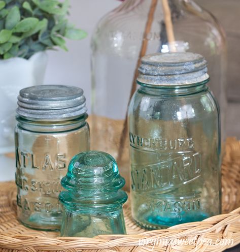 Patriotic Centerpiece with Vintage - Vintage Atlas Mason Jar and Lynchburg Standard Mason Jars used in a patriotic vignette. #masonjar #vintagemasonjar Vintage Mason Jar Decor Ideas, Vintage Glass Jar Decor, Vintage Canning Jars, Old Liquor Bottles, Vintage Jar Storage, Mason Jar Herbs, Tinted Mason Jars, Bleach Bottle, Vintage Blue Mason Jars Decor