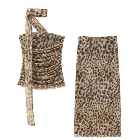 PRICES MAY VARY. Crafted from high-quality materials, this set offers both style and comfort. Whether you're dancing the night away or enjoying a romantic dinner, you'll feel effortlessly chic and confident in this sophisticated ensemble. Indulge your inner fashionista with our Sweet and Spicy Leopard Print Camisole Top and Skirt Set for Women, a two-piece ensemble that seamlessly blends sweetness with a dash of sass. This high-end set exudes sophistication and allure, perfect for the confident Tube Top And Skirt, High Waist Long Skirt, Pleated Tops, Skirts Midi High Waisted, Printed Skirt, Printed Midi Skirt, Silk Screen, Two Piece Sets, Skirt Suit