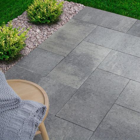 Oldcastle 24-in L x 12-in W x 2-in H Rectangle Rio Blend Concrete Patio Stone Lowes.com Patio With Concrete Squares, Crushed Concrete Patio, Gray Brick Patio, Rectangle Paver Patio, Back Patio Flooring Ideas, Concrete Pad Patio Ideas, Cement Pavers Patio, Black Concrete Patio, Dark Grey Deck