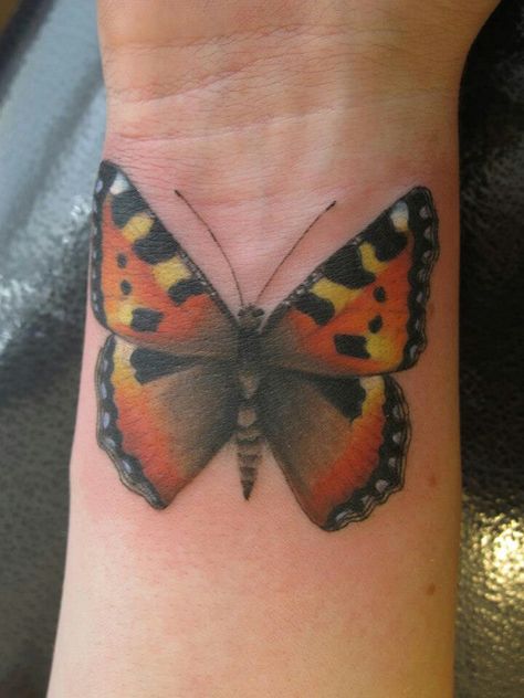 Tortoise shell butterfly Small Tortoiseshell Butterfly Tattoo, Tortoiseshell Butterfly, Realistic Butterfly Tattoo, Butterfly Tattoo Cover Up, Butterfly Name Tattoo, 2024 Tattoo, Butterflies Tattoo, Butterfly Wrist Tattoo, Shell Butterfly