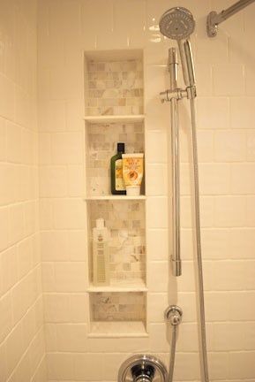 Tile shower shelf, between the studs.  Another pinner said: We did this when we remodeled & it looks so much better than a wire thing hanging on the shower head. Shower Inset, Tile Shower Shelf, Shower Shelf, Master Shower, Shower Niche, Master Bath Remodel, Bathroom Reno, Shower Shelves, Bathroom Redo