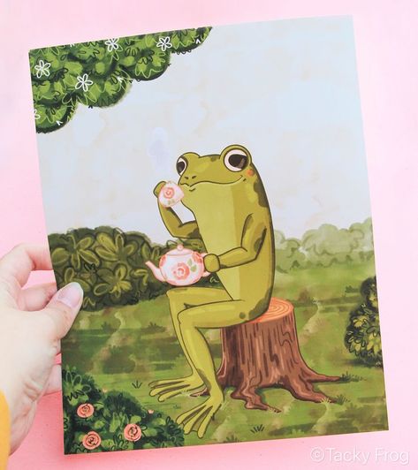 An 8 x 10 inch art print of a frog sitting on a tree stump in a garden while drinking tea from a floral tea set. Frog Drinking Tea, Frog Tea, Cottagecore Frog, Green Poster, Frog Sitting, Frog Tattoos, Frog Art, Green Frog, Tree Stump