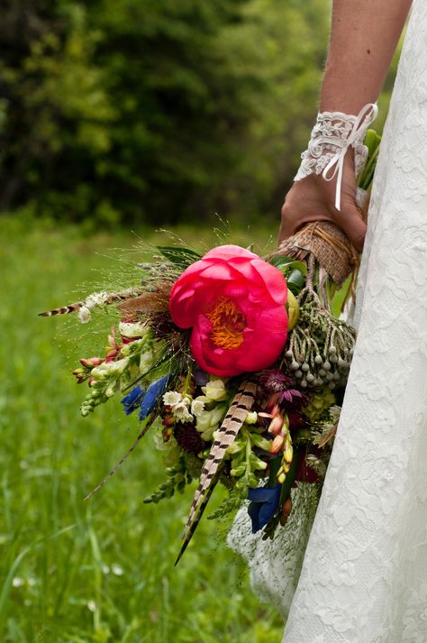 Wedding bouquet with pheasant feathers and large peony. Pheasant Feather Bouquet, Bouquet With Pheasant Feathers, Feather Bouquet, Pheasant Feather, Plus Size Wedding Gowns, Spring Wildflowers, Pheasant Feathers, Wildflower Bouquet, Plus Size Wedding