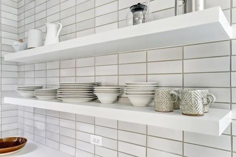 30 Creative Subway Tile Backsplashes | Subway Tile Ideas for Kitchens | HGTV Black Wooden Floor, Light Gray Countertops, Gray Subway Tile Backsplash, Hgtv Kitchens, Amazing Kitchens, Stainless Steel Farmhouse Sink, Backsplash Tile Design, Subway Tile Backsplash Kitchen, Grey Backsplash