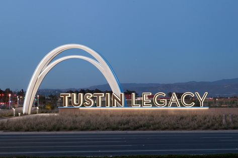 Identity Signage and Sculpture for Tustin Legacy residential community and park in Tustin, California. Identity Signage. Identity Sign Design. Gateway Signage. Gateway Sign Inspiration. Park Sign Design. Park Wayfinding. Residential Community Wayfinding. Wayfinding Inspiration. Identity Sign Inspiration. Sculpture Sign Design. Sculpture Inspiration. Archway Sculpture. Archway Inspiration. Civic Design. Graphic Design Orange County. Experiential Graphic Design. Environmental Graphic Design. Totem Signage, Gateway Signage, Graphic Design Orange, Park Wayfinding, Tustin California, Experiential Graphic Design, Entrance Signage, Sign Inspiration, Park Signage