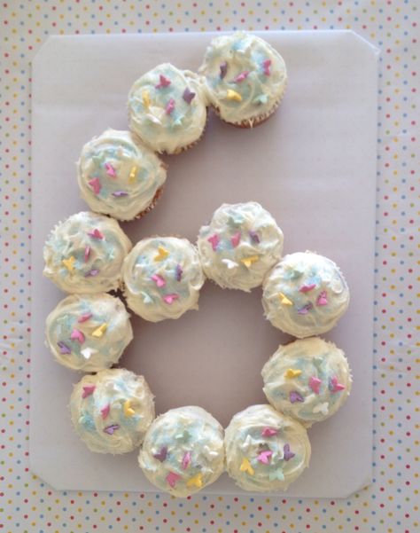 Birthday cupcakes with sugar butterflies decoration for 6 year old girl :) I used vanilla cake mix and icing by Betty Crocker and decorated with sugar butterflies and sprinkled sky blue sugar on top. 6th Birthday Cupcakes Girl, Cupcake 6 Shape, Birthday Ideas For 6 Year Girl, 6 Year Birthday Cake, 6 Yrs Old Girl Birthday Party Ideas, 5 Cupcake Cake Number, 6 Cupcake Cake Number, Cupcake Birthday Cake Number, Easy Pull Apart Cupcake Cake Birthday