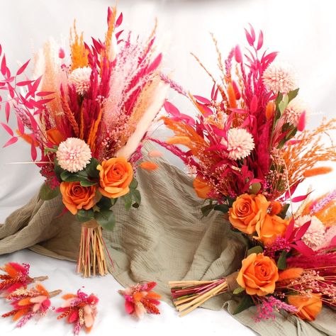 I have being waiting over a year to create for these beautiful flowers . I think we all know by now how much I absolutely love bright colours, but pink and orange is one of my favorites. I am so pleased with how they have turned out, and even happier the bride trusted me to create her beautiful flowers for her. we still have 20% off all 2025 weddings until September, if you would like a quote for your unique wedding flowers please message the page #pinkorangewedding #brightdriedflower... Sunset Flowers Aesthetic, Flowers For Her, Orange And Pink Wedding, Sunset Flowers, Wedding Bouquets Pink, Unique Wedding Flowers, Flowers Aesthetic, Wedding Florals, Pampas Grass