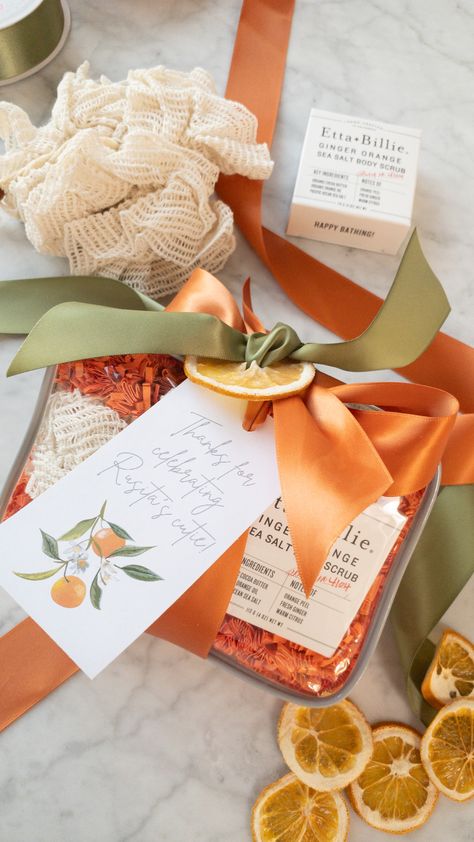 Ginger orange body scrub bar paired with a loofah exfoliation sponge in a reuseable toiletry bag, topped with dried orange slice, ribbon and gift tag. Orange Body Scrub, Sea Salt Body Scrub, Exfoliating Sponge, Orange Baby Shower, Orange Slice, Employee Appreciation Gifts, Wedding Welcome Bags, Event Gifts, Central Valley