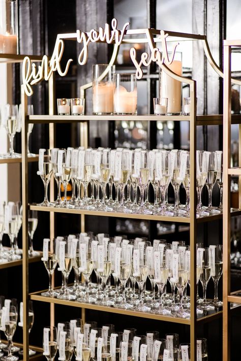 Champagne And Bronze Wedding, Gold Champagne Wedding Theme, Black White Gold Champagne Wedding, Champagne Bookshelf Wedding, Sagamore Pendry Wedding, Black Gold Champagne Wedding, Champagne Shelf Wedding, Black And Gold Bridal Party, New Year’s Eve Wedding Colors