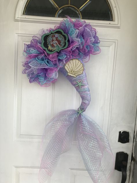 Little Mermaid wreath #wreathsforfrontdoor #littlemermaid #creationsbysilvia Dollar Tree Mermaid Tail Wreath, Dollar Tree Mermaid Tail, Dollar Tree Mermaid, Mermaid Tail Wreath, Dollar Tree Witch Hat Wreath, Dollar Tree Witch Hat, Mermaid Wreath, Diy Mermaid Tail, Witch Hat Wreath