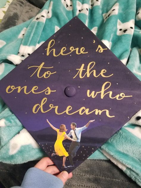 Song Lyric Graduation Cap Ideas, Lala Land Graduation Cap, La La Land Graduation Cap, La La Land Grad Cap, White Grad Cap Ideas, Orange Grad Cap Ideas, Movie Graduation Cap, Fleetwood Mac Graduation Cap, Film Graduation Cap