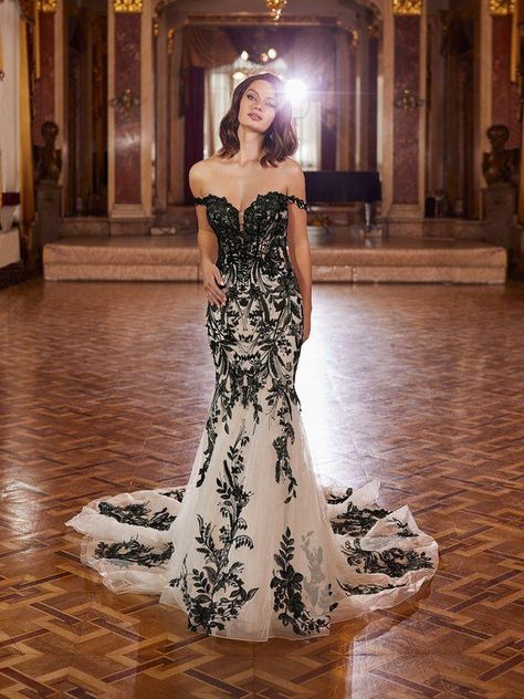 A gown that takes glamour to the next level, meet Moonlight Couture Style H1476. This mermaid beauty lavishly captures the essence of beauty with its black accent embroidered lace appliques with sequins and sparkle net detailing all throughout the gown. Dainty swag sleeves gently sit on either side of your arms, giving you a high-fashion finish. #weddingdress #mermaidweddingdress #blacklaceweddingdress #bridalgown #weddingdressideas Moonlight Couture, Bohemian Bridesmaid Dress, Bride Dress Vintage, Black Lace Wedding, Moonlight Bridal, Winter Bridesmaid Dresses, Ivory Lace Wedding Dress, Petite Wedding Dress, Spring Wedding Dress