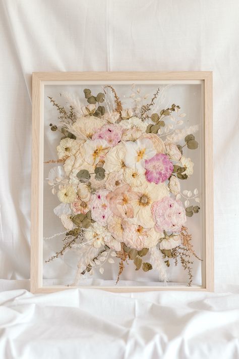 Display your wedding bouquet, event florals, or sentimental blooms in our Natural Wood Frame. This contemporary frame features a soft textured finish, making it the ideal home for your pressed bouquet. Looking for hands-on involvement throughout your preservation process? Add our Peony Experience to your cart! This service level package includes continuous communication with our Client Relationship Team and Creative Manager for a tailored experience that fits your needs. All orders include the T Wedding Floral Preservation, Pressed Bouquet Frame, Pressed Bridal Bouquet, Pressed Peonies, Wedding Flowers Preservation Ideas, Framed Bouquet, Preserved Wedding Flowers, Pressed Bouquet, Framed Flowers