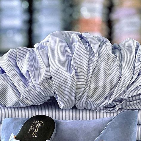 Charvet on Instagram: "Refinement indoors. 
Charvet’s travel slippers were created fifty years ago and are available in 128 shades of suede kidskin or nappa leather with matching carrying case. The calfskin suede outer sole ensures noiseless footsteps, while the inner sole is padded for additional comfort. Pictured here, the delicate shade of blue is deepened by buffing the full grain leather, which gives it a cloudy, almost transparent look.

 ---
Le raffinement intérieur. 
Créées il y a cinquante ans, les mules de voyage Charvet sont disponibles en 128 nuances de chevreau suédé ou de nappa assorties à celle de l'étui. La semelle extérieure, en veau suédé, assure une démarche silencieuse, tandis que la semelle intérieure est capitonnée. Ici, la nuance tendre du bleu est approfondie par le Travel Slippers, Carrying Case, Nappa Leather, Full Grain Leather, Instagram