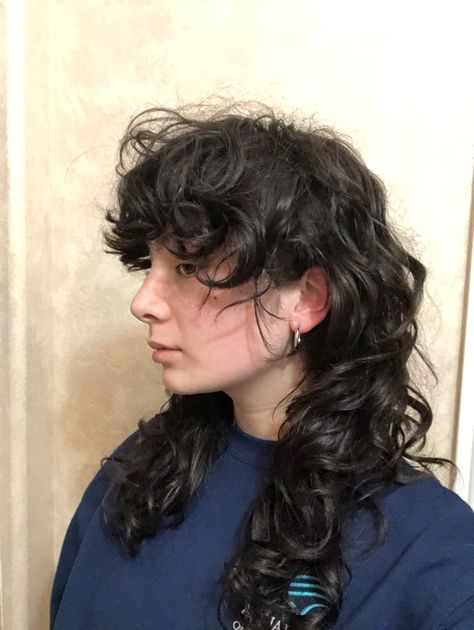 medium length wavy hair, mullet or shag style haircut Curly Shag Wolfcut Haircut, Shullet Hairstyles Long Curly, Mullet Hairstyle Wavy Hair, Long Shaggy Mullet Curly Hair, Shag Mullet Curly Hair Long, Long Curly Shag Mullet, Shaggy Mullet Wavy Hair, Rock Haircuts For Women, Womens Shag Haircut Short