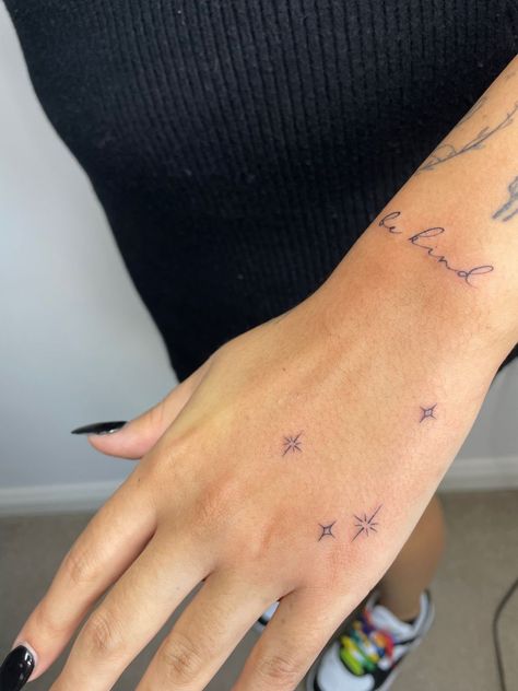 Manifest Hand Tattoo, Hand Star Tattoo, Hand Sparkle Tattoo, Stars On Hand Tattoo, Star Hand Tattoos, Dainty Hand Tattoos, Finger Tattoos Words, Aesthetic Tattoo Ideas, Side Hand Tattoos