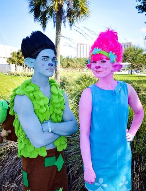 Jocelynn: This is my husband (Cody Irvine) and I (Jocelynn Irvine) as Branch and Poppy! We saw the movie and really related to the characters! We used fleece fabric to create... Branch And Poppy Costumes, Trolls Movie Costume, Poppy And Viva Costumes, Poppy And Branch Costume, Poppy Costume Diy, Trolls Cosplay, Troll Costume Diy, Poppy Halloween Costume, Branch Costume