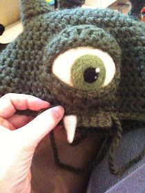 Twist & Loop: Beauty is in the Eye of The Beholder Dragon Hat Crochet, Crochet Dragon Hat, Crochet Pattern Dinosaur, Dragon Hat, Dragon Hats, Local Yarn Shop, Crochet Dragon, Eye Of The Beholder, Halloween Hats