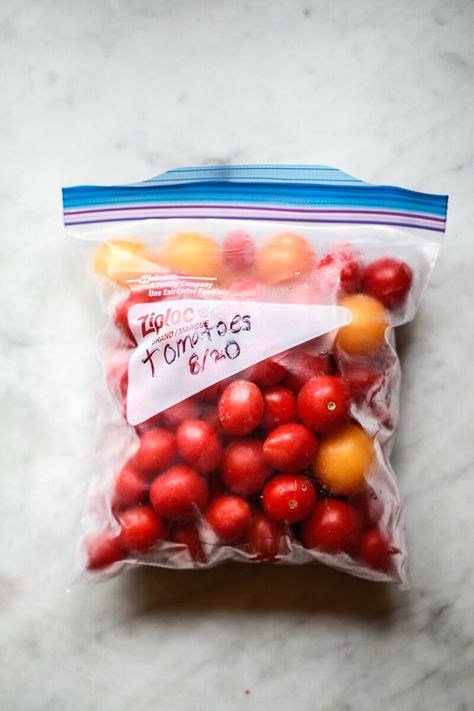 Find out how to freeze tomatoes, from whole to cherry to green, the quick and easy way. Perfect for spaghetti sauce and no need to blanch. Freeze Fresh Tomatoes, Freezing Cherry Tomatoes, How To Freeze Tomatoes, Freezing Recipes, Freezing Tomatoes, Freeze Avocado, Freezing Vegetables, Cherry Tomato Recipes, Cherry Tomato Sauce