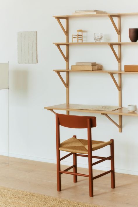 Turn your workspace into a creative space. The J39 Mogensen Chair in Heritage Red adds a vibrant touch to your desk setup, inspiring productivity with a pop of personality. Here, styled together with the BM29 shelf, it can be used both as a shelving system and as a desk. #fredericiafurniture #j39mogensenchair #desk #bmshelves #interiordesign #design #interior #officeinspiration Modular Table, Family Dining Rooms, Shelving Solutions, Small Home Offices, Danish Furniture Design, Borge Mogensen, Backless Bar Stools, Hanger Design, Danish Furniture