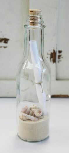 DIY: Bottle, sand, and seashells available at Michaels Coastal Wedding Invitations, Summer Party Favors, Beach Table, Beach Diy, Beach Wedding Favors, Coastal Wedding, Beach Theme Wedding, Message In A Bottle, Beach Crafts