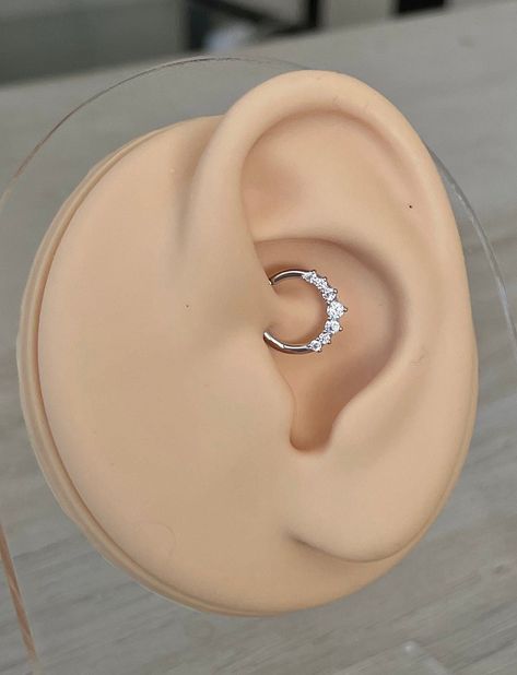 "This clicker piercing is made of 14K gold with CZ crystals. Can be used as daith jewelry, septum ring, cartilage  tragus hoop, and more! ♥ Listing is for a single item ♥ Piercing \"clicks\" into place. Super dainty minimalist look - drop jaws with this body jewelry! **PACKAGE INSURANCE: Please either upgrade to priority express shipping at checkout if you would like to insure your package OR you can also purchase insurance separately Insurance up to $100 for $1.50 here:  https://www.etsy.com/li Daith Helix Piercing, Daith Piercing Hoop, Silver Daith Jewelry, Daith Piercing Silver, Daith Piercing Jewelry Silver, Ear Piercing Ideas Daith, Gold Daith Jewelry, Daith Ring, Piercing Daith