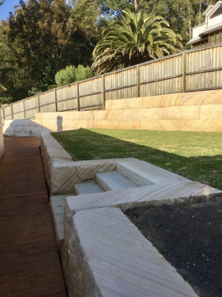 Retaining Walls Front Of House, Sandstone Retaining Wall Landscaping, Retaing Walls Landscape, Sandstone Retaining Wall, Landscape Retaining Wall Ideas, Retaining Wall Ideas Hillside Backyard, Sandstone Fence, Sandstone Stairs, Sandstone Landscaping