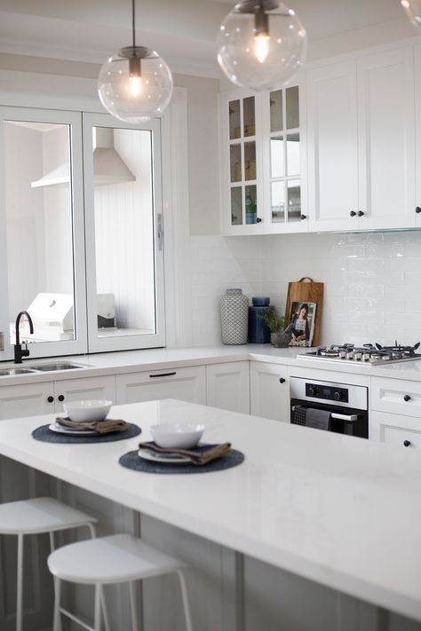 Kookaburra Homes create a stylish kitchen design with white custom cabinetry and beautiful Caesarstone® Calacatta Nuvo™ surfaces. Discover more inspiration on our colour page.  ⁠​  Builder: Kookaburra Homes (SA)​ Photography: She Creative​ Benchtops: Caesarstone® Calacatta Nuvo™​  #caesarstoneau #kookaburrahomes #calacattanuvo #kitchendesign #kitchenideas #kitchen #whitekitchen #caesarstoneaustralia #Caesarstone #kitcheninspiration Calacatta Nuvo Caesarstone, Caesarstone Calacatta Nuvo, Caesarstone Kitchen, Modern Hamptons, Stylish Kitchen Design, Calacatta Nuvo, House Colour, Modern Hampton, Coastal House