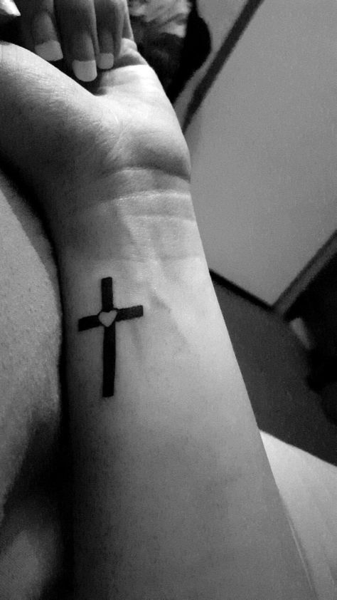 Cross with heart tattoo, small. Love this!! Cross With Heart Tattoo, Cross Heart Tattoos, Crosses Tattoo, Biblical Tattoos, Heart Tattoo Wrist, Good Tattoo Quotes, Tattoo Heart, New Tattoo Designs, Tattoos For Black Skin